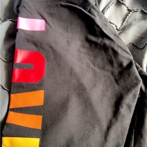 Victoria's Secret Black Leggings with Pink, Red, and Orange Accents